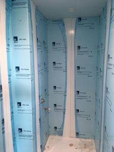 Altro Whiterock hygienic wall cladding installed in shower cubicles