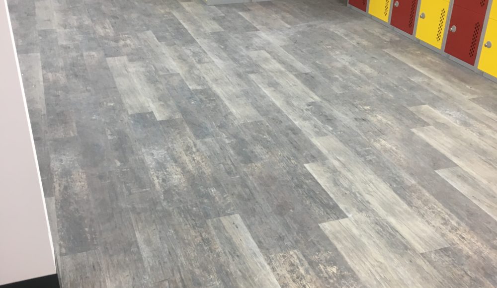 Grey Karndean vinyl planks in staff locker room