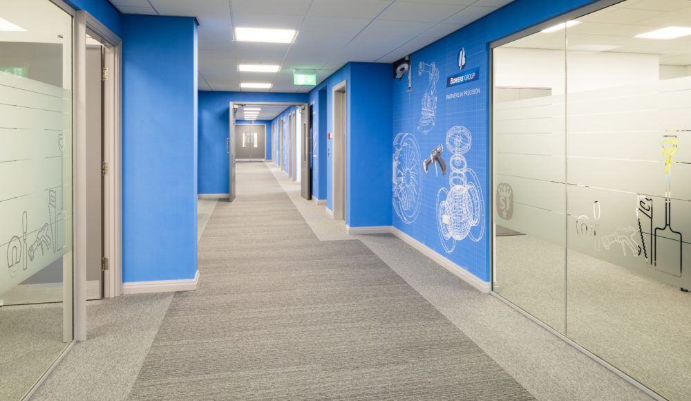 Grey Desso carpet tiles installed in Spear & Jackson corridor