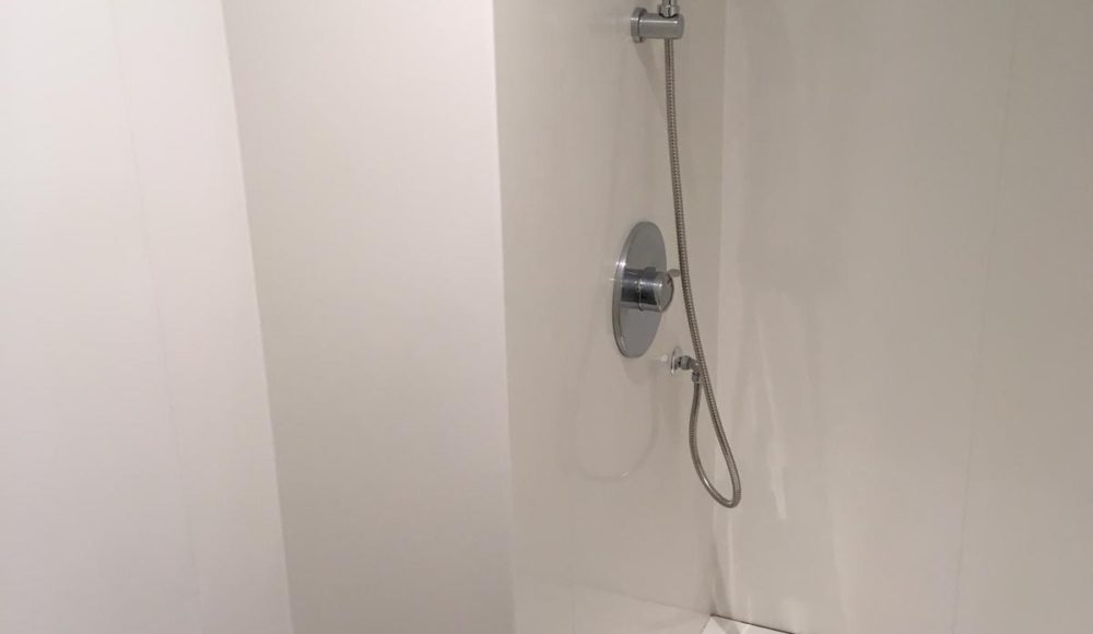 Altro whiterock hygienic wall cladding installed in shower cubicle