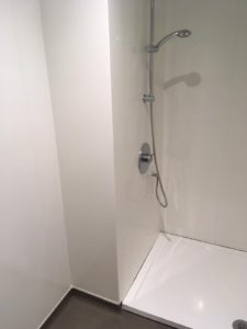 Altro whiterock hygienic wall cladding installed in shower cubicle